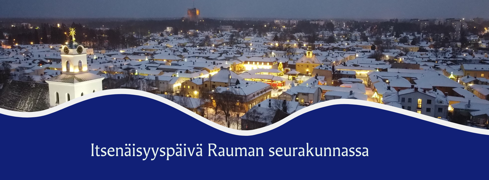 Ilmakuvaa kirkosta ja kaupunkimaisemasta. Teksti: Itsenäisyyspäivä Rauman seurakunnassa